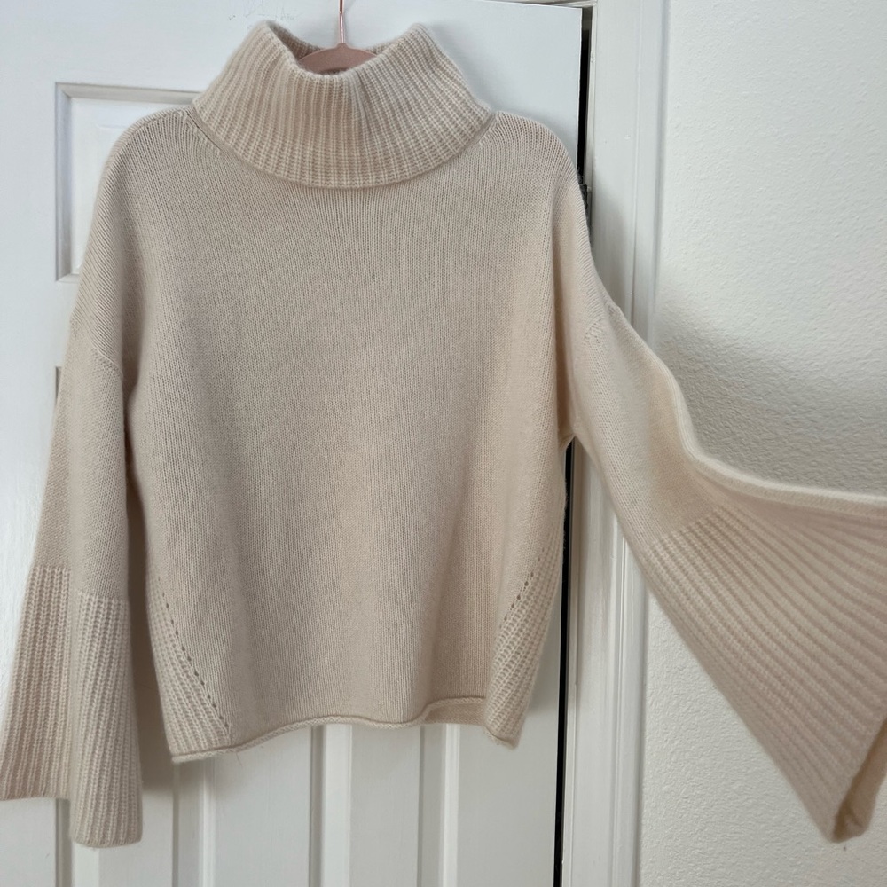 360 cashmere mock neck cream sweater with flare sleeves